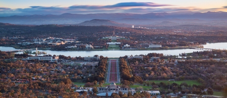 a view of a large body of water with a city in the background