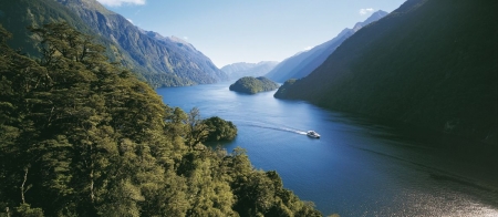 a body of water with Doubtful Sound in the background