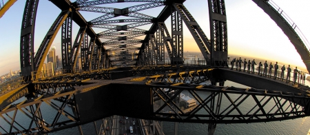 a train crossing a bridge over water