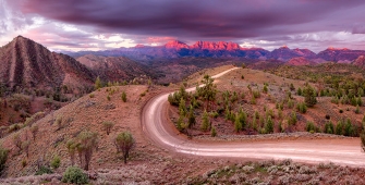 a canyon with a mountain in the background