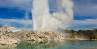 a body of water with smoke coming out of it