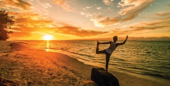 a sunset over a body of water