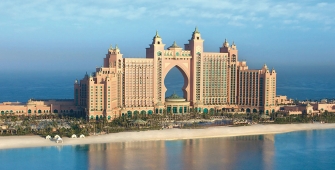 a large body of water with Atlantis, The Palm in the background