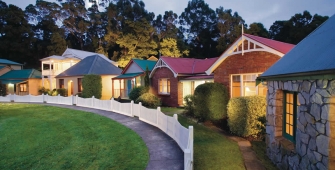 a house with trees in the background