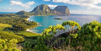 a body of water with Lord Howe Island in the background