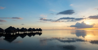 a sunset over a body of water