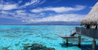 a pool next to a body of water