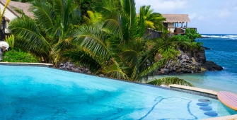 a pool next to a body of water