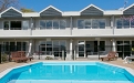 a pool in front of a building