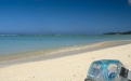 a person sitting at a beach