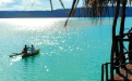 a group of people on a boat in a body of water