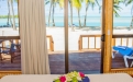 a dining room table in front of a window