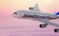 a large passenger jet flying through a cloudy blue sky
