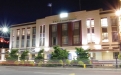 a close up of a street in front of a building