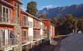 a building with a mountain in the background