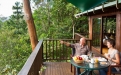 a man sitting at a picnic table