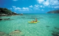 Couple kayaking around Lizard Island