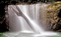 a waterfall into a body of water