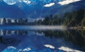 a lake with a mountain in the background