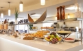 a kitchen with a plate of food on a table