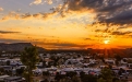 a view of a city at sunset