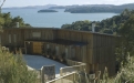 a bridge going over a wooden fence