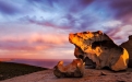 a canyon with a sunset in the background