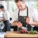 a man preparing food on a table