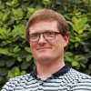 a man smiling for the camera