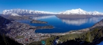 a body of water with a mountain in the background