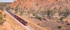 a train is on the side of a mountain