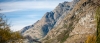 a canyon with a mountain in the background