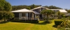 a large lawn in front of a house