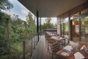 a dining room table in front of a window