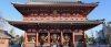 a large building with Sensō-ji in the background